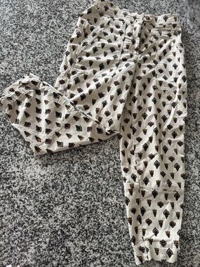 Anthropologie Cream Joggers with Multicolor Floral Accents